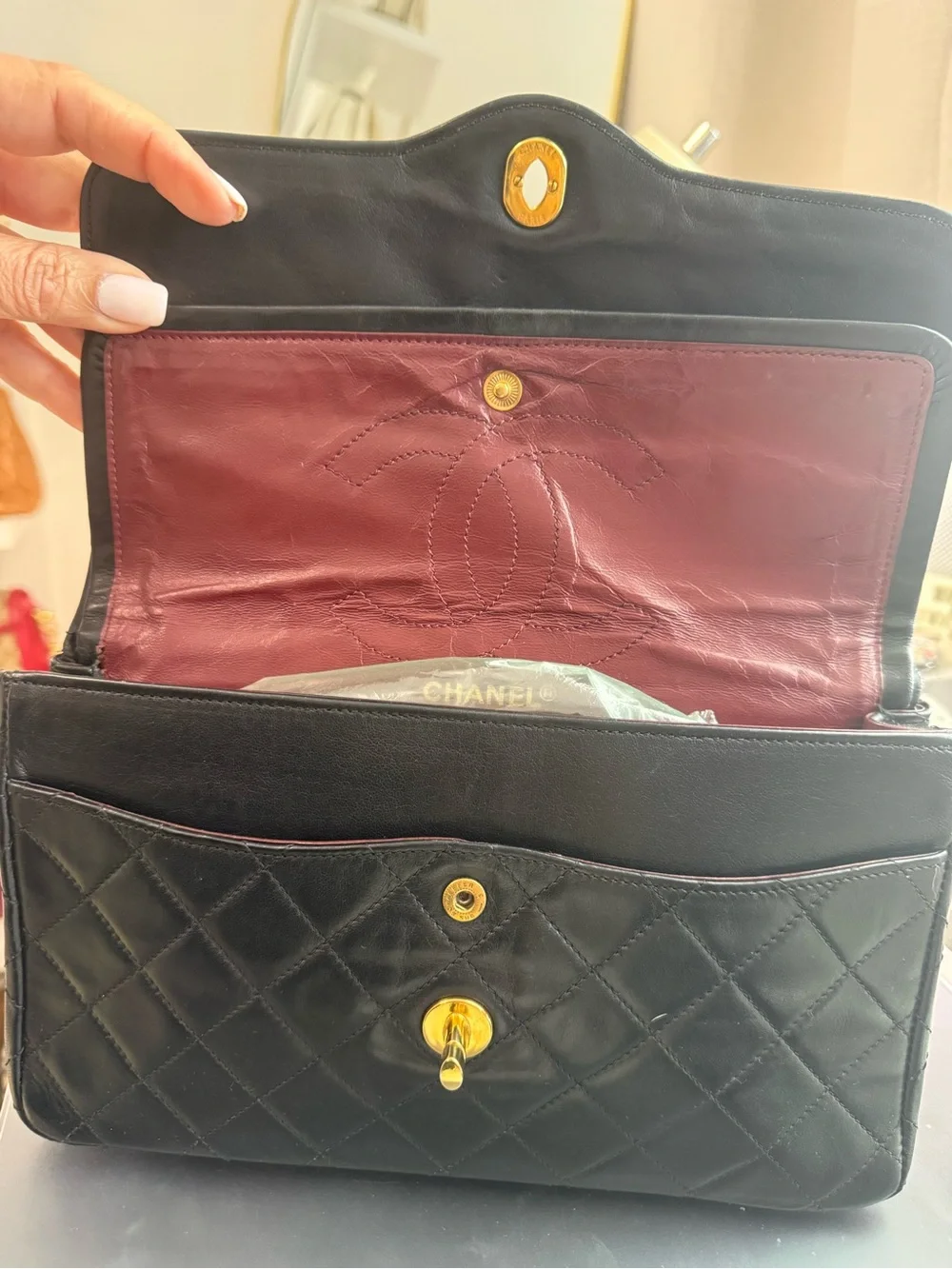 CHANEL Black Quilted Leather Shoulder Bag with Gold Chain Strap